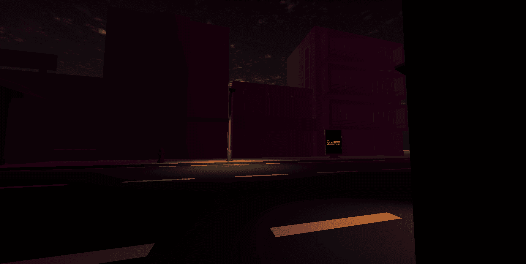 Wide nighttime Gece Marketi main-road environment with dark buildings and street lighting.